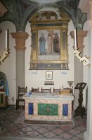 ancona lignea raffigurante il Cristo eucaristico  con la Madonna e san Giovanni evangelista